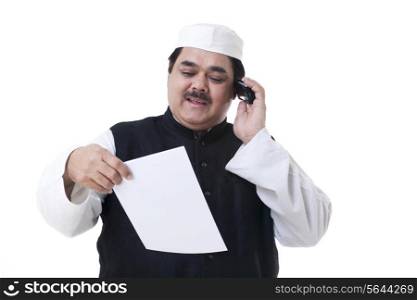 Male politician looking at a document