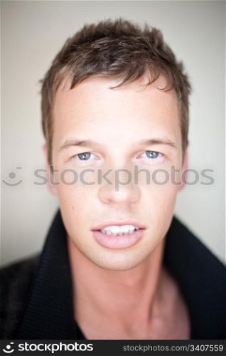 Male Portrait. Close up portrait of handsome young male, shallow depth of field, focus on eyes