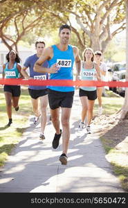 Male Runner Winning Marathon