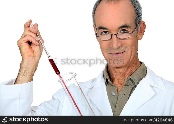 Male scientist conducting experiment