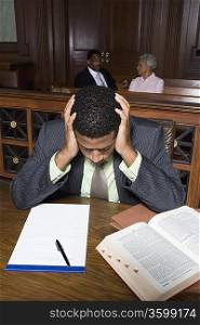 Male solicitor working in court