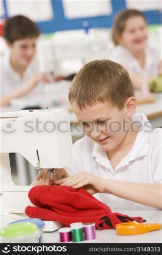 Male student using sewing machine