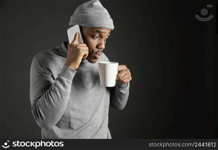 male wearing cap talking phone 4