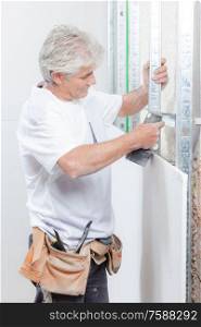 male worker during wall partition