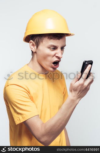 Male worker talking on mobile phone