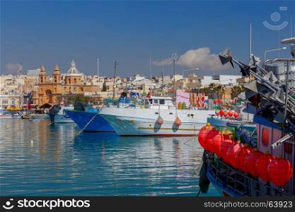 Malta. Marsaxlokk. Traditional fishing boats.. Fishing boats in the harbor Marsaxlokk. Malta.