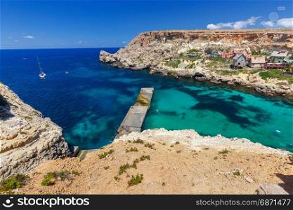 Malta. Village Popeye.. View of the famous village Popeye and bay on a sunny day. Malta.