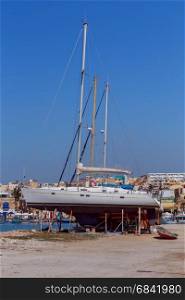 Malta. Yachts on the shore.. Sea yachts on the shore near village of Marsaxlokk. Malta.