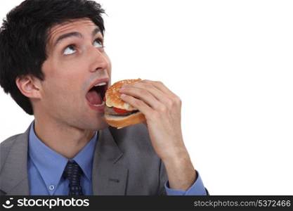 Man about to eat a burger