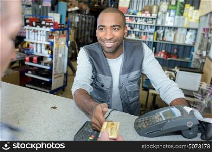 Man accepting card payment from customer