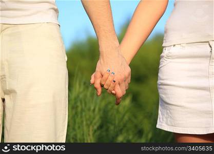 man&acute;s and female&acute;s hands to be held for each other
