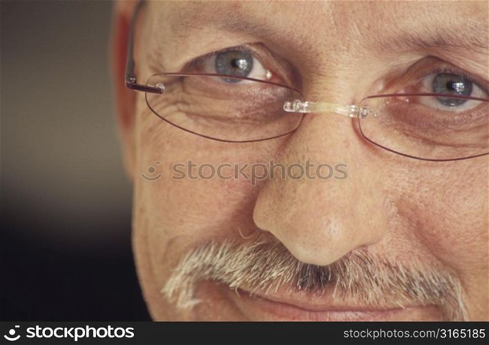 Man&acute;s Eyes and Mouth Smiling