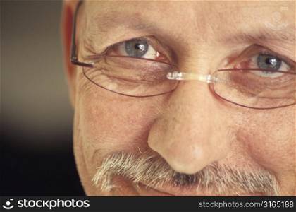 Man&acute;s Eyes and Mouth Smiling