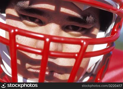 Man&acute;s Face in a Football Helmet