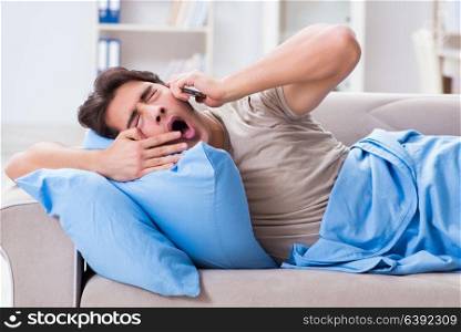 Man addicted to his mobile phone in bed