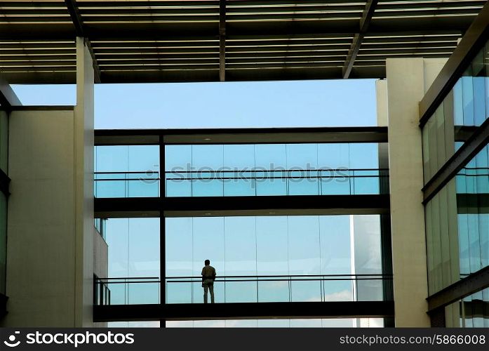 man alone in the modern office building