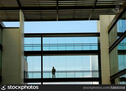 man alone in the modern office building