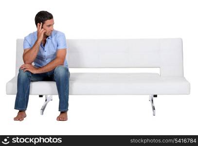Man alone on the couch