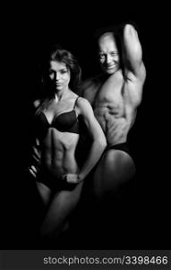 man and a woman trained in the gym