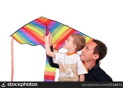 man and boy hold kite above head
