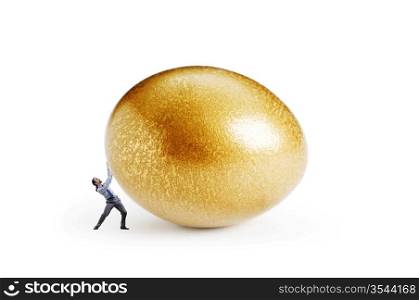 Man and golden egg isolated on white
