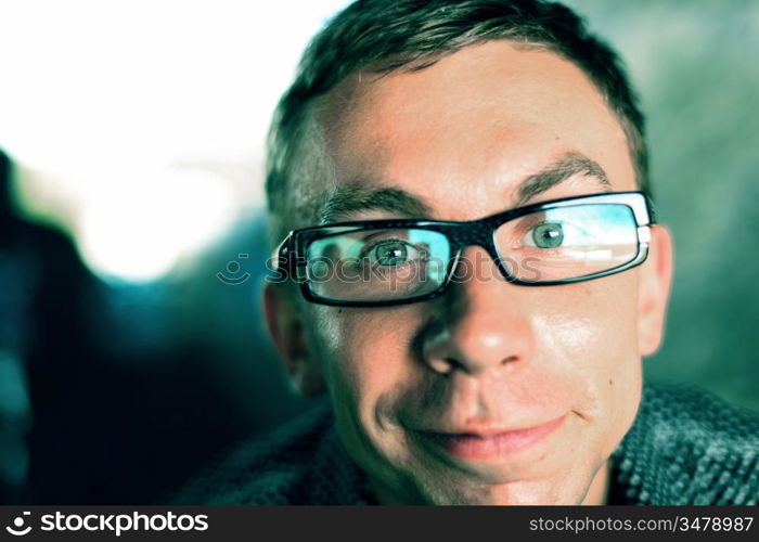 man and his reflection in glass