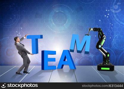 Man and robotic arm in teamwork concept