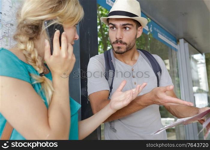 man and woman argue where to go