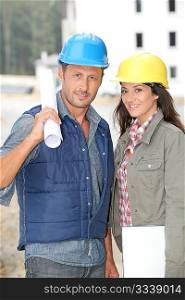 Man and woman at a building site