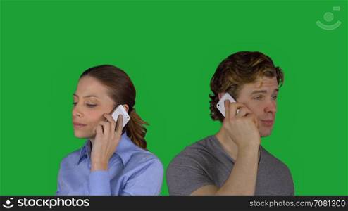 Man and woman back to back on phone (Green Key)