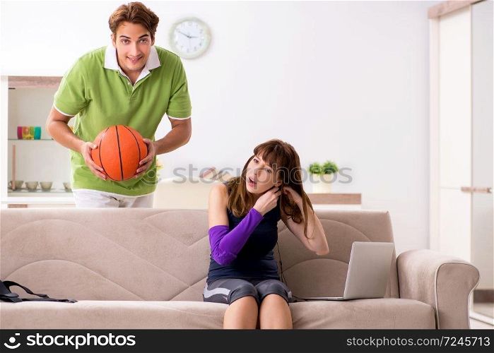 Man and woman discussing sports injury