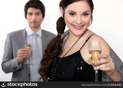 Man and woman drinking champagne for a celebration