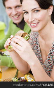 Man and woman eating health food