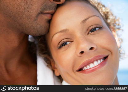 Man and woman embracing close up of woman&acute;s face