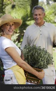 Man and woman gardening