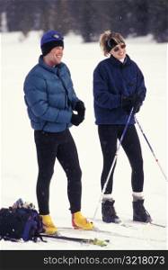 Man and Woman Going Skiing Together