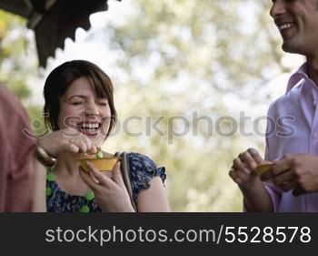 Man and woman having street food