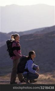 Man and Woman Hiking Together