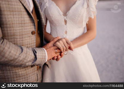 Man and woman hold hands close up. Hands of man and woman close up.. Man and woman hold hands close up