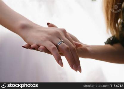 Man and woman hold hands. Man and woman hold hands close up