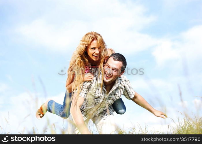 man and woman hug in the sky