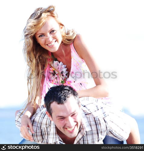 man and woman hug in the sky and sea on sea