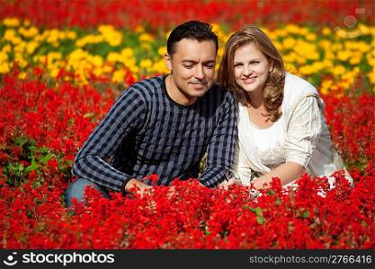 man and woman in braces in flowering park