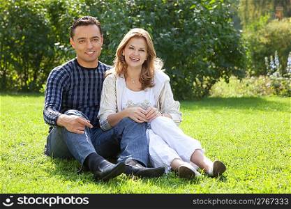 man and woman in braces laughing outdoors