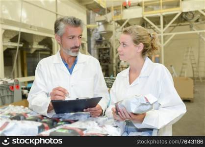 Man and woman in factory