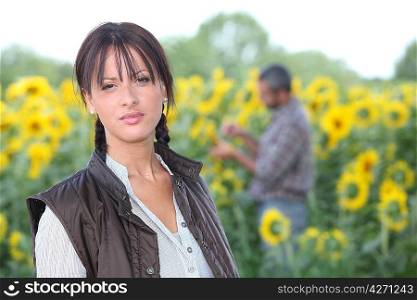 Man and woman in sunflower field