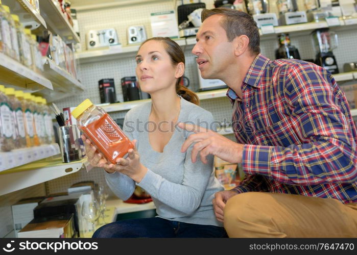 Man and woman ingredient shopping