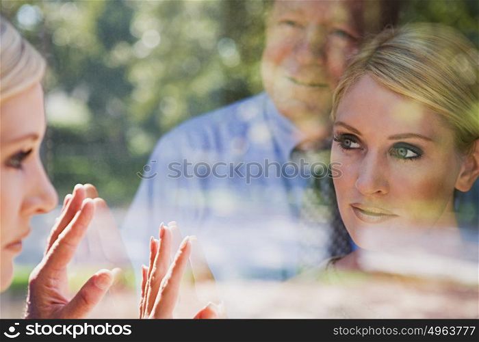 Man and woman looking at reflections