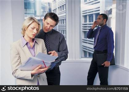 man and woman meeting in office