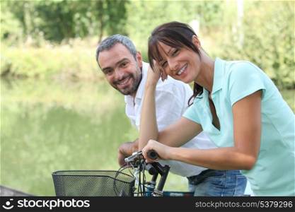 Man and woman out for a bike ride in the country